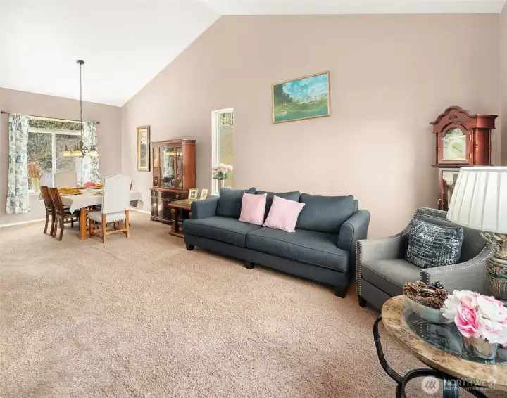 The great room has soaring ceilings