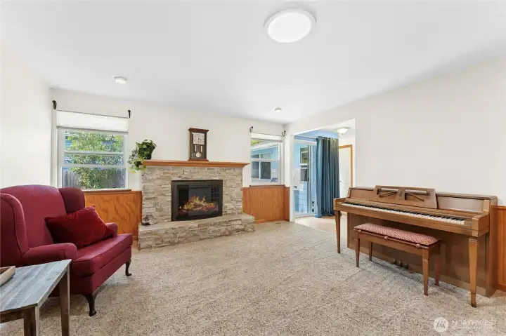 Living room with wood burning fireplace