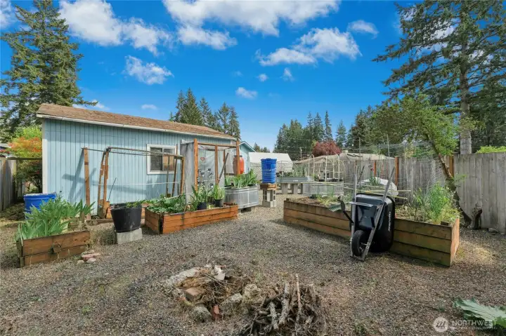 Even more garden work space behind out building.