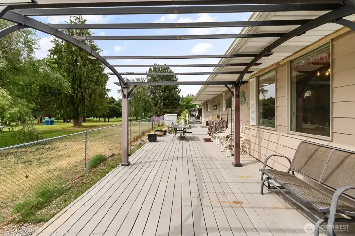 rear deck- door from living area and from kitchen. Fully fenced rear yard