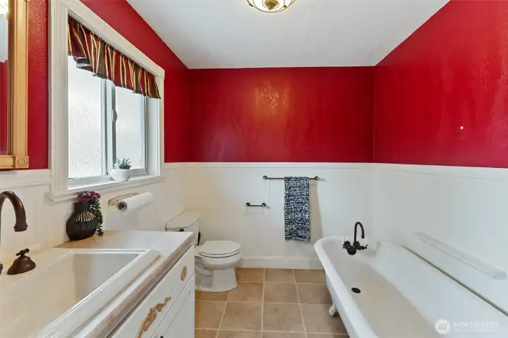 Main floor Bathroom with claw foot tub off of kitchen area- add washer and dryer?