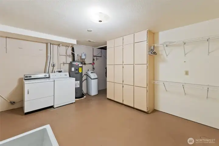 Large Utility room with deep sink on lower level-loads of storage, around the corner too