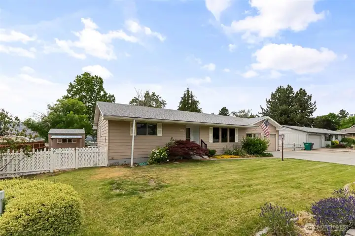 Gate to rear yard- large storage shed and plenty of room to garden too!
