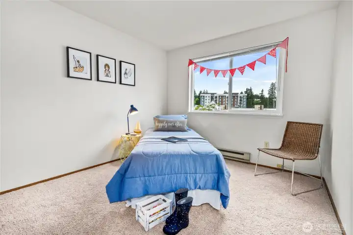 Bedroom with nice flow of lighting. New carpet and painting add to what does not need to be done in this home.