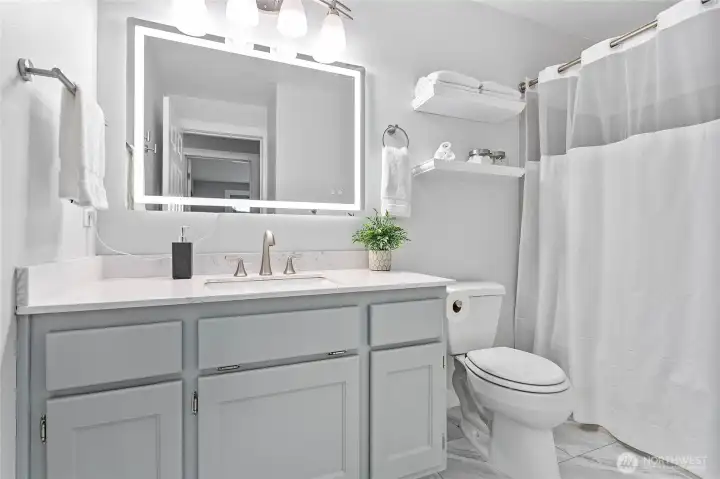 Upper level full bathroom. Upper level full bathroom.
