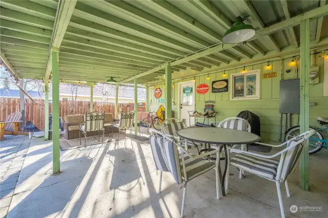 The door off the kitchen accesses the covered back patio