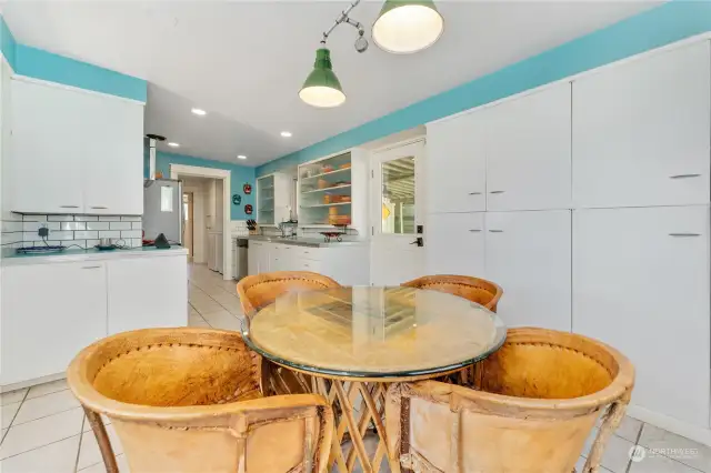 Dining room with ample cabinetry