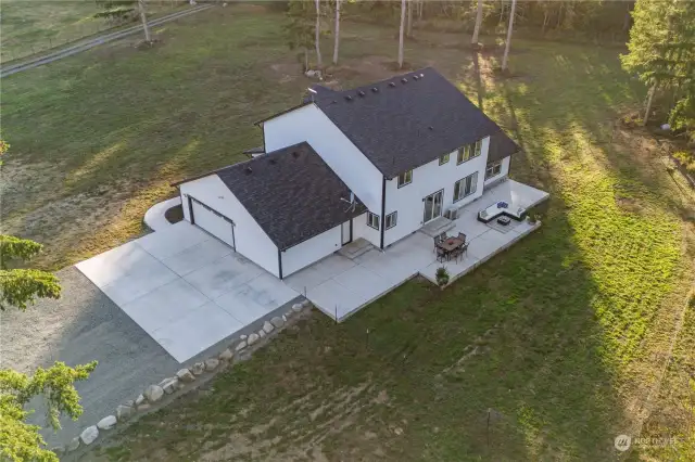 brand new concrete and patio for parking and entertaining in the backyard.