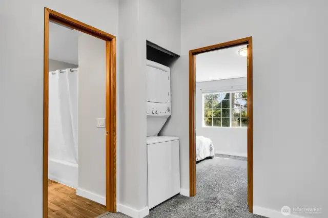 Washer and Dryer conveniently located on the upper level outside adjacent to the bedrooms and bathroom.