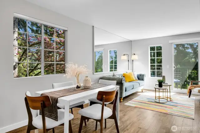 Dining area conveniently located between the kitchen and living room.