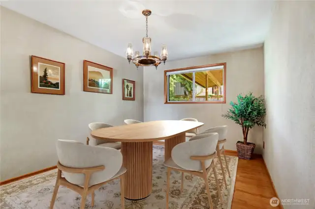 Virtually staged dining room was originally a bedroom