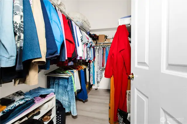 The spacious primary closet has room for all your accessories