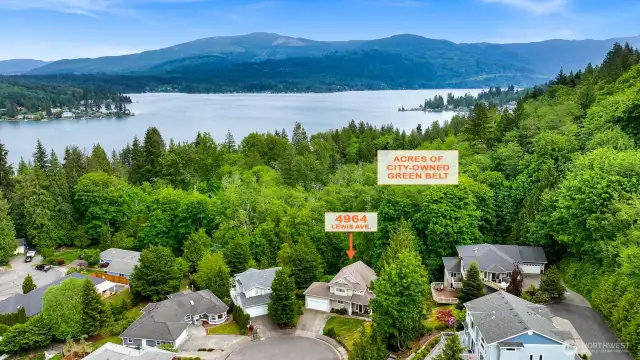 Located at the end of a cul-de-sac with no traffic and backing up to nothing but public green space that will never be developed!
