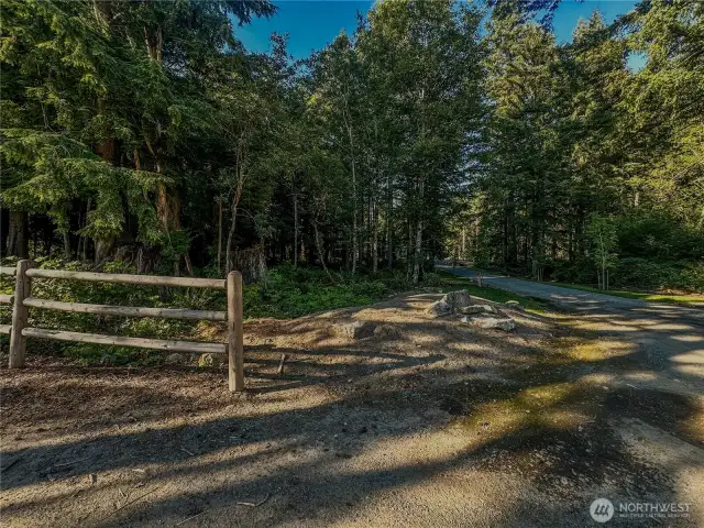 Front of lot from Berger Road showing private drive.