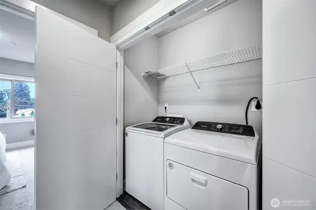 Convenient upstairs laundry with newer washer and dryer.
