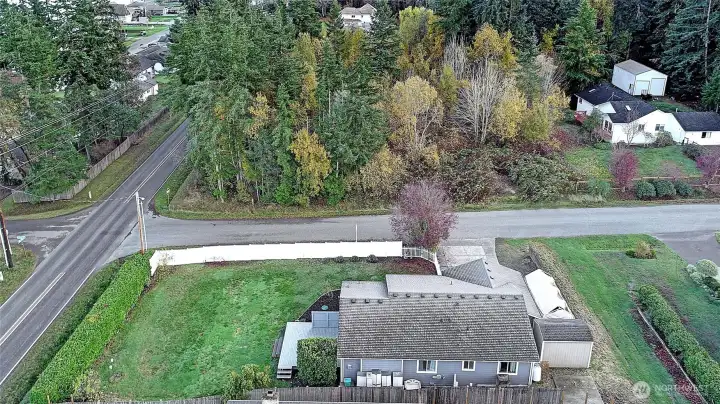 Home & property offers a large shed, RV/Boat parking, huge fenced yard, & privacy!