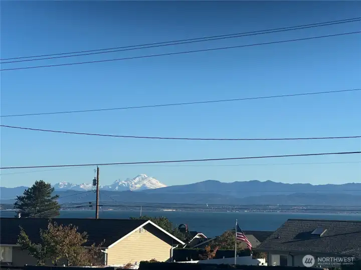 Better in person! View from the this cute house! Mt Baker, Cascade Mountains, & Puget Sound.