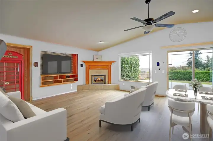 Spacious living room & dining area w/views of mountains & water!