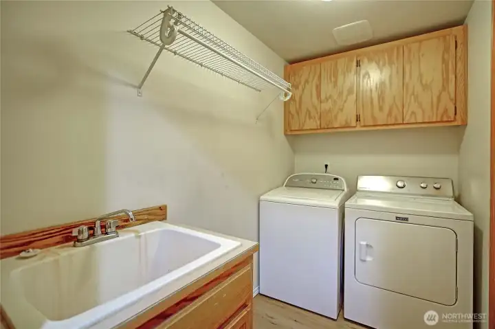 Great laundry room with large utility sink!