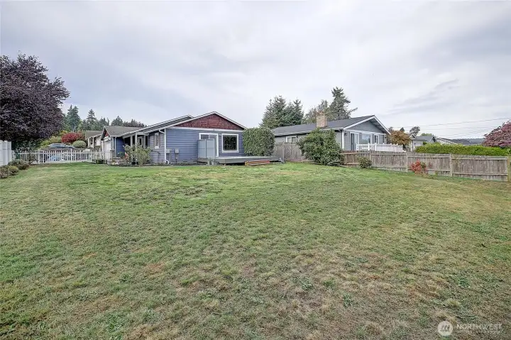 Spacious yard has room for play equipment, fire pit, & more!