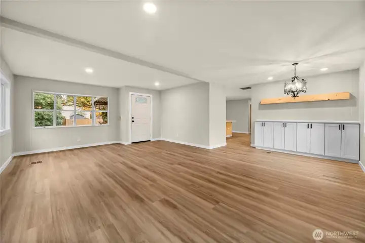 Dining room off living room with built in cabint