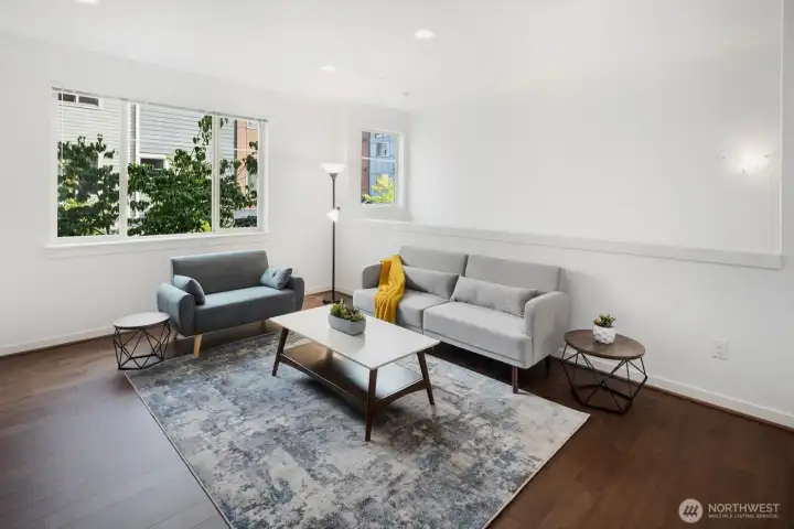 Engineered Hardwood flooring throughout.