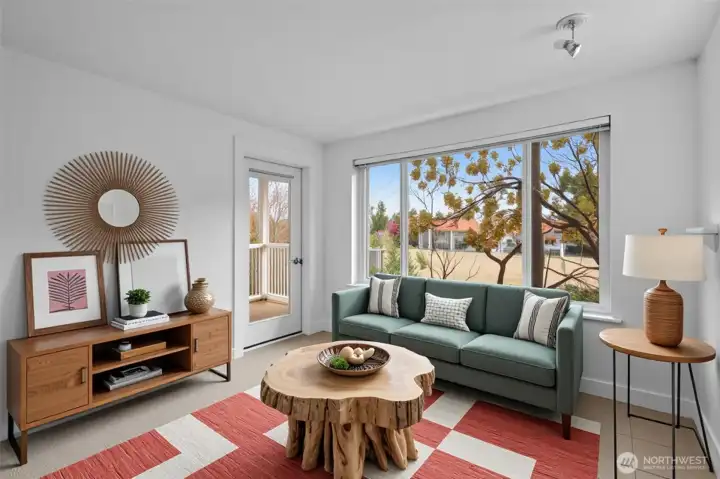 Attached balcony deck with storage closet to keep you organized is perfect for relaxing and inviting the outdoors in.
