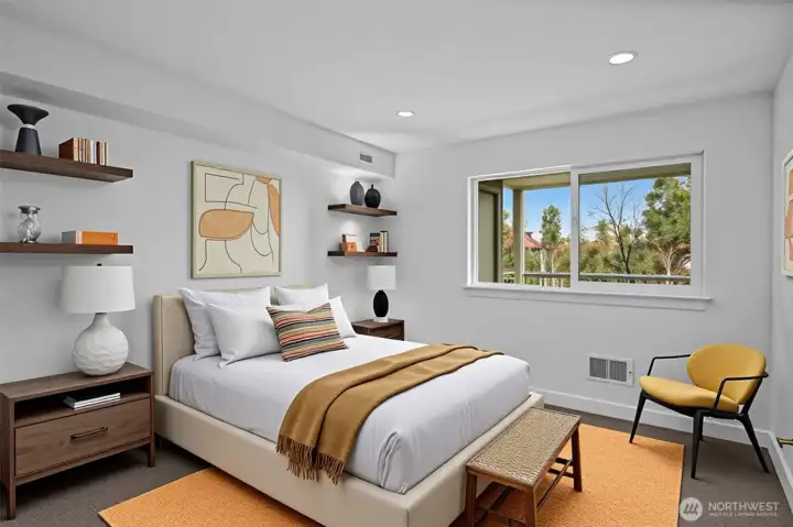 Primary bedroom with new carpet and fresh paint.