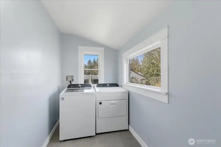 Laundry area secluded from living area but close enough.