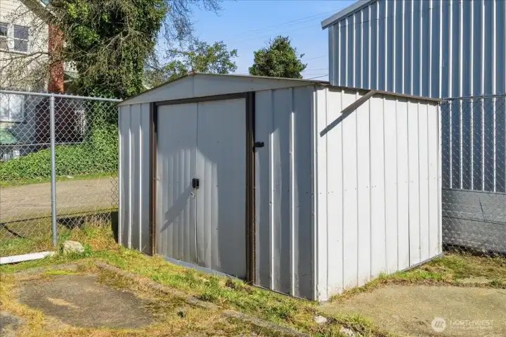 Garden shed, storage in fully fenced back yard.