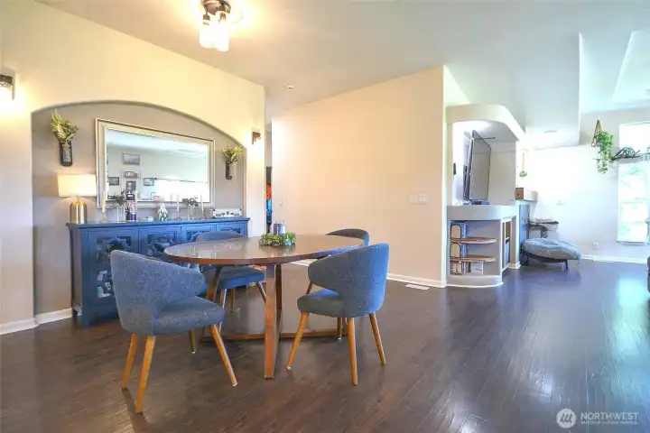 Open dining area adjacent to the kitchen, perfect for family meals and entertaining.