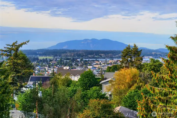 True Northwest Beauty. From mountains to sound to territorial views, this home was built to appreciate them all.