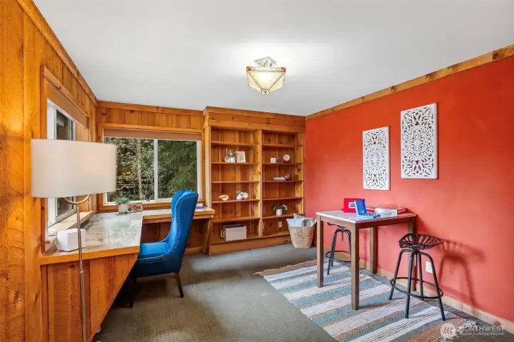 Wonderful flex space on main floor, currently utilized as office/den space, however, could be a fourth bedroom in the main floor.