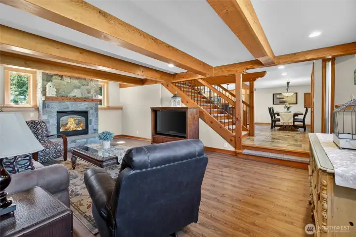 1st floor living room with timber beams and warm fireplace make it cozy on PNW nights! 1st floor living room with timber beams and warm fireplace make it cozy on PNW nights!