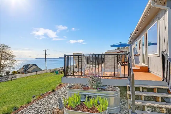 Inviting view deck designed for outdoor living, offering stunning water views and the perfect setting for relaxing or entertaining.