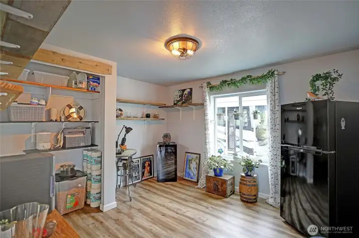 Bright and flexible second bedroom offering space for guests, a home office, or multi-purpose use.