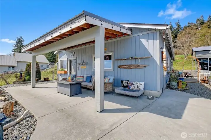 Expansive shop/garage with multiple versatile rooms, offering flexible space for hobbies, entertainment, fitness, or storage.