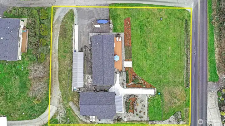 Road behind the home is an easement providing access to the neighboring property.