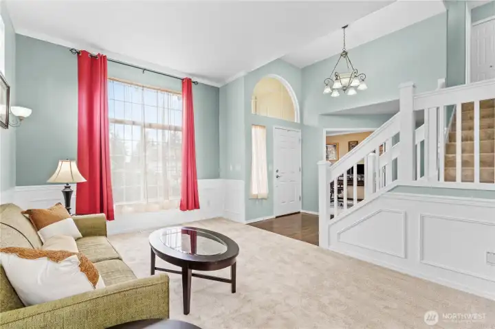 Enter to high ceilings, large windows and brand new carpeting!