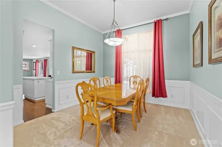 Dining room flows seamlessly to the kitchen