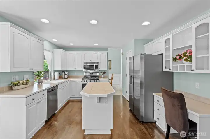 Updated kitchen features walk in pantry, stainless aplliances and more