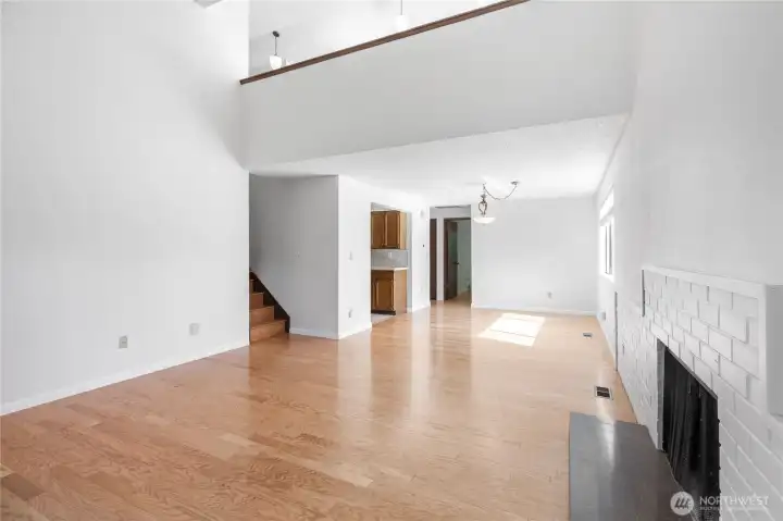 The living room has a wood-burning fireplace.