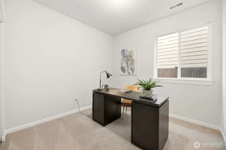 Main floor bedroom could be used for an office too.
