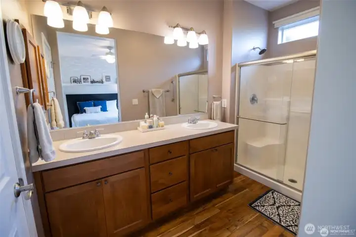 Primary Bath has a walk in shower and a lovely walk in closet