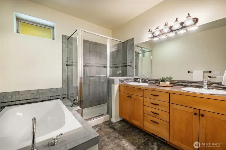 Primary bathroom with walk-in shower, soaker tub and double sinks Primary bathroom with walk-in shower, soaker tub and double sinks
