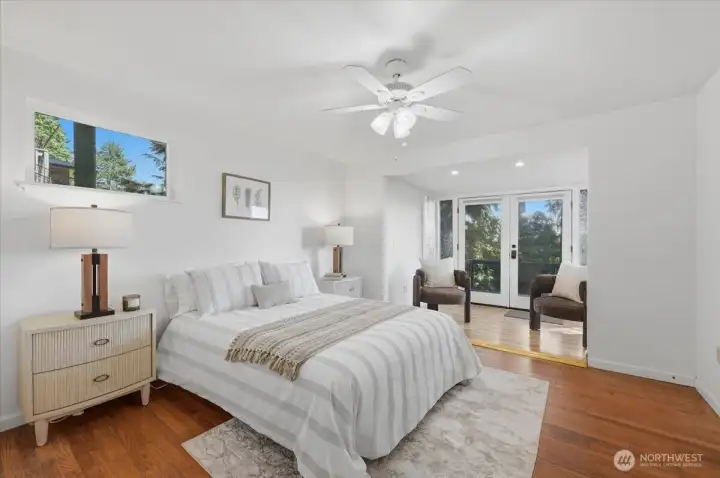 Primary bedroom steps from sitting room. Primary bedroom steps from sitting room.