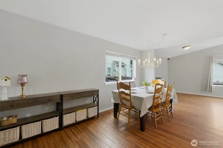 Dining room leads into office/gathering room for a large connected space