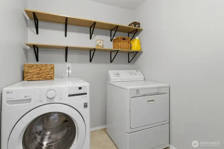 Convenient upstairs laundry room.