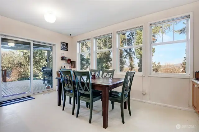 Breakfast nook in the kitchen with views of the valley and patio access