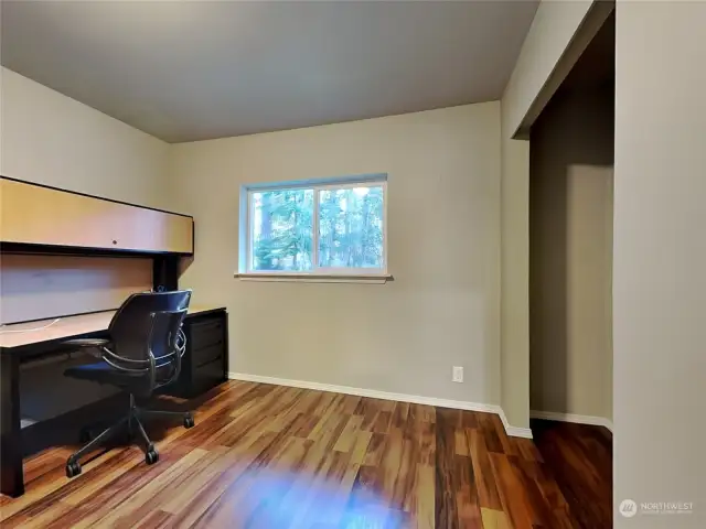 Another spacious bedroom, currently used as an office